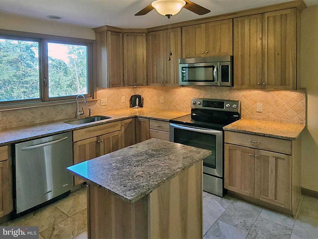 1245 Khyber Pass Road Linden, VA 22642 - Photo 33 of 55 Granite counters, secluded lighting
