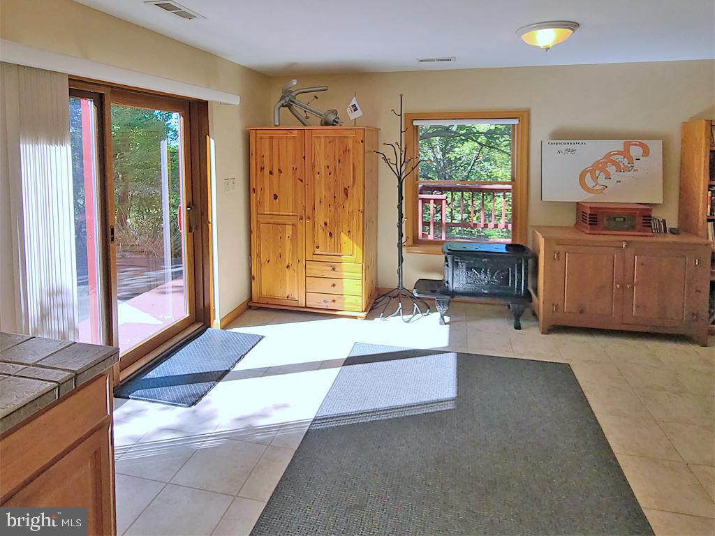 1245 Khyber Pass Road Linden, VA 22642 - Photo 51 of 55 Family room, slider to driveway & deck on left