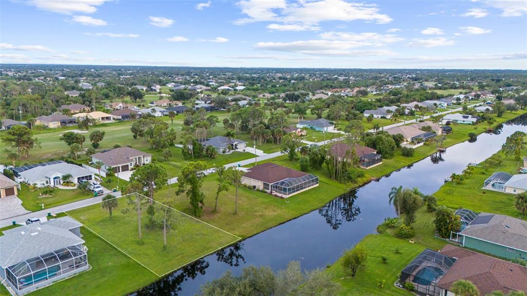 29 Marker Road Rotonda West, FL 33947 - Photo 6 of 11 an aerial view of residential houses with outdoor space