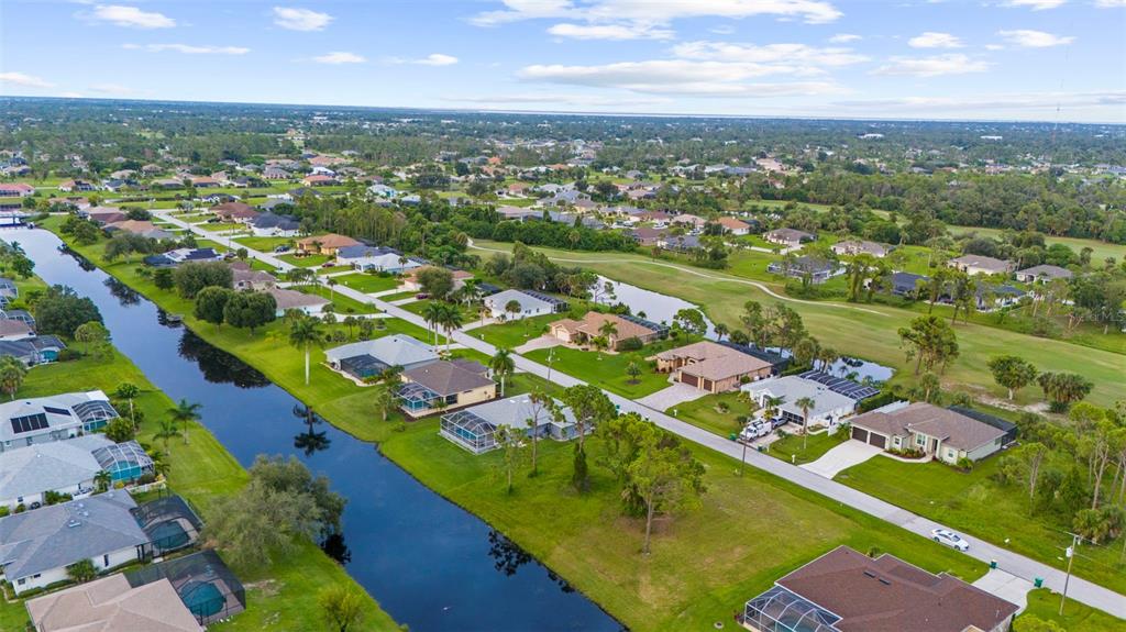29 Marker Road Rotonda West, FL 33947 - Photo 9 of 11 an aerial view of residential houses with outdoor space