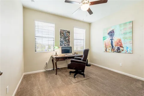 a view of storage and utility room with racks on the wall
