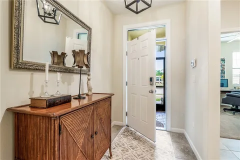 a room with a table and a mirror