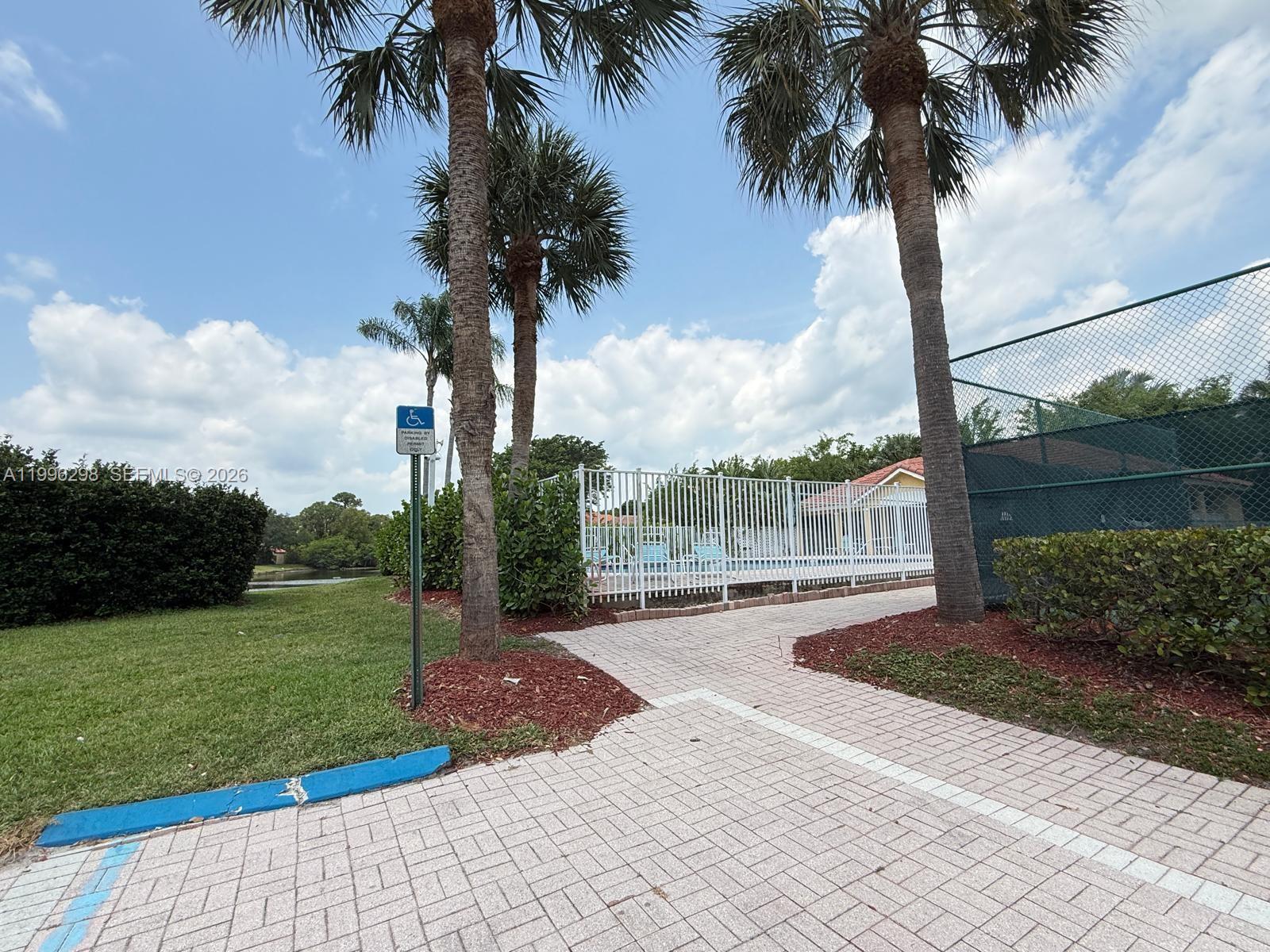 1016 Via Jardin, Unit 1016 Riviera Beach, FL 33418 - Photo 20 of 21 a view of a backyard