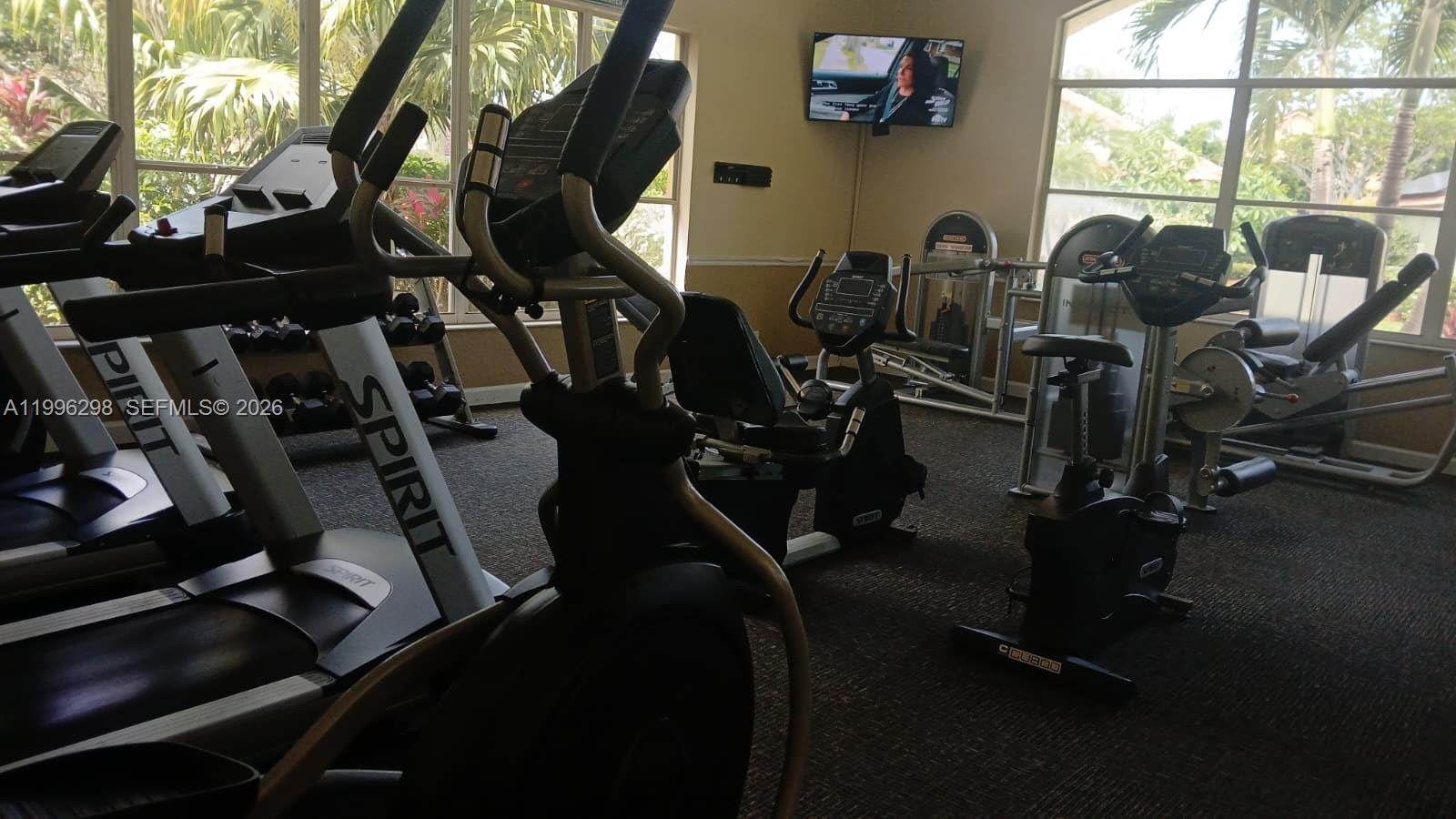1016 Via Jardin, Unit 1016 Riviera Beach, FL 33418 - Photo 21 of 21 a view of a room with gym equipment