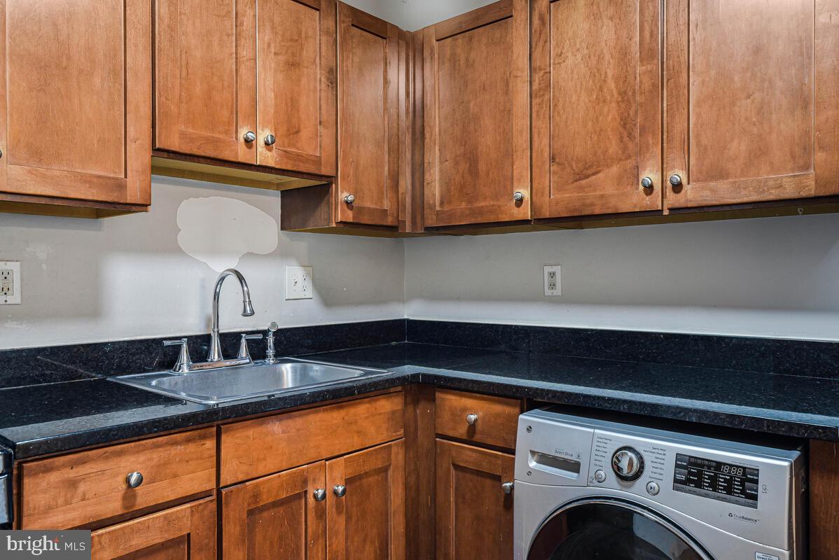 3103 Naylor Road Southeast, Unit 304 Washington, DC 20020 - Photo 14 of 28 a close view of sink and cabinets