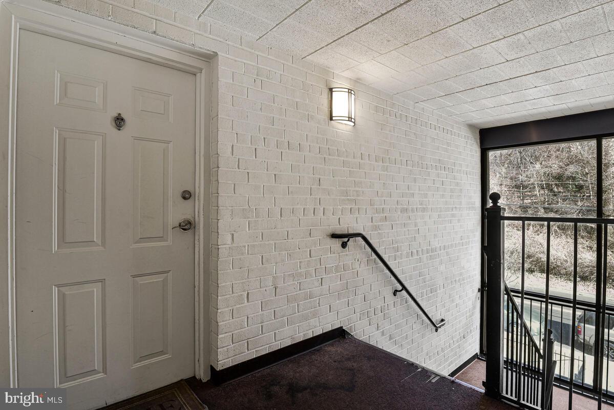 3103 Naylor Road Southeast, Unit 304 Washington, DC 20020 - Photo 4 of 28 a view of entryway with wooden floor