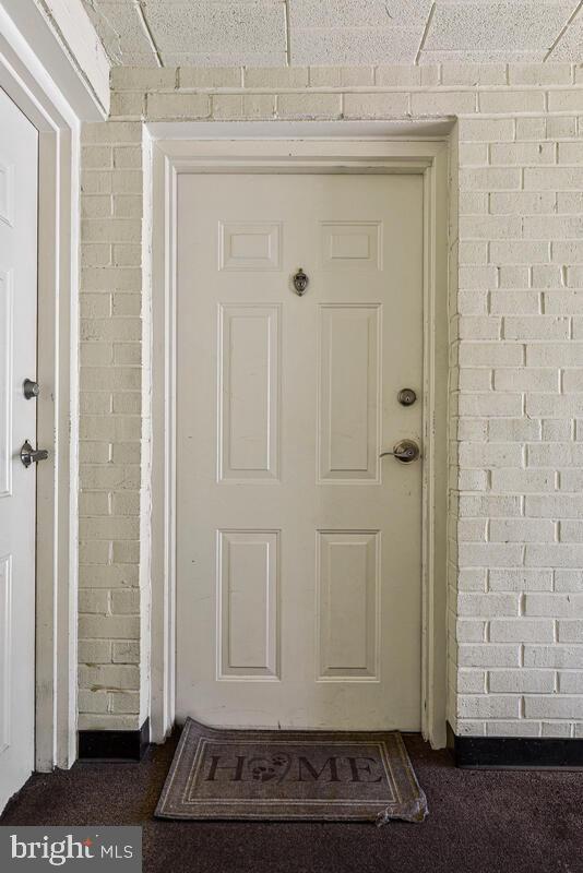 3103 Naylor Road Southeast, Unit 304 Washington, DC 20020 - Photo 5 of 28 a view of a wooden door