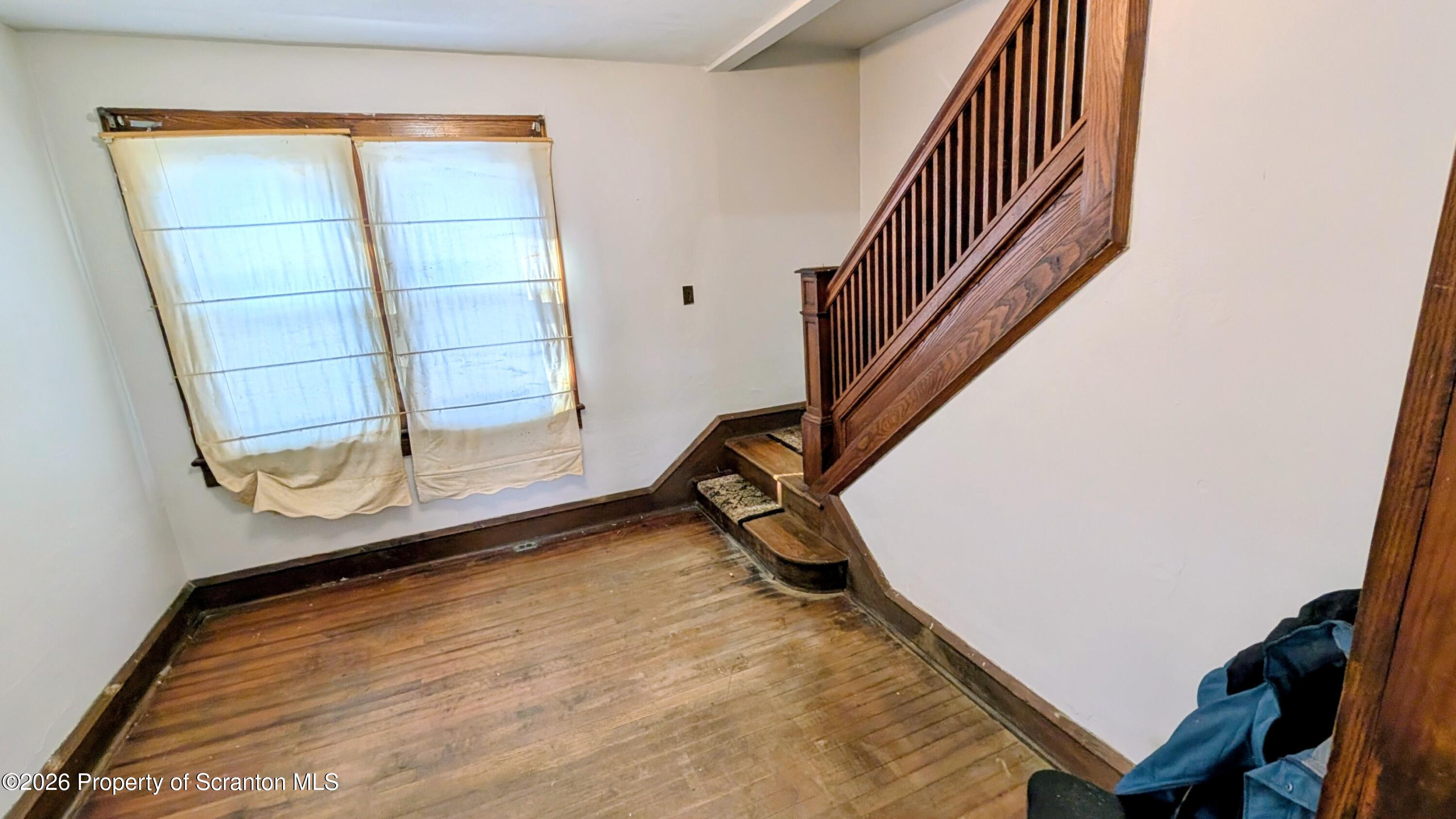 509 Main Street Duryea, PA 18642 - Photo 7 of 30 a view of entryway with wooden floor