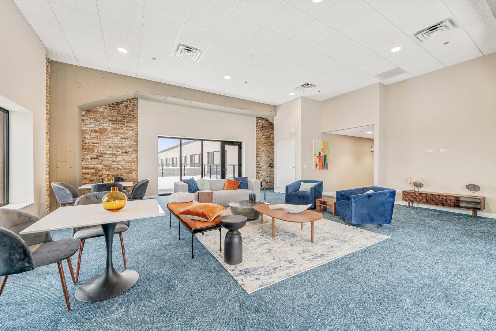 1900 West Lawrence Avenue, Unit 231 Chicago, IL 60640 - Photo 22 of 23 a living room with furniture and a table