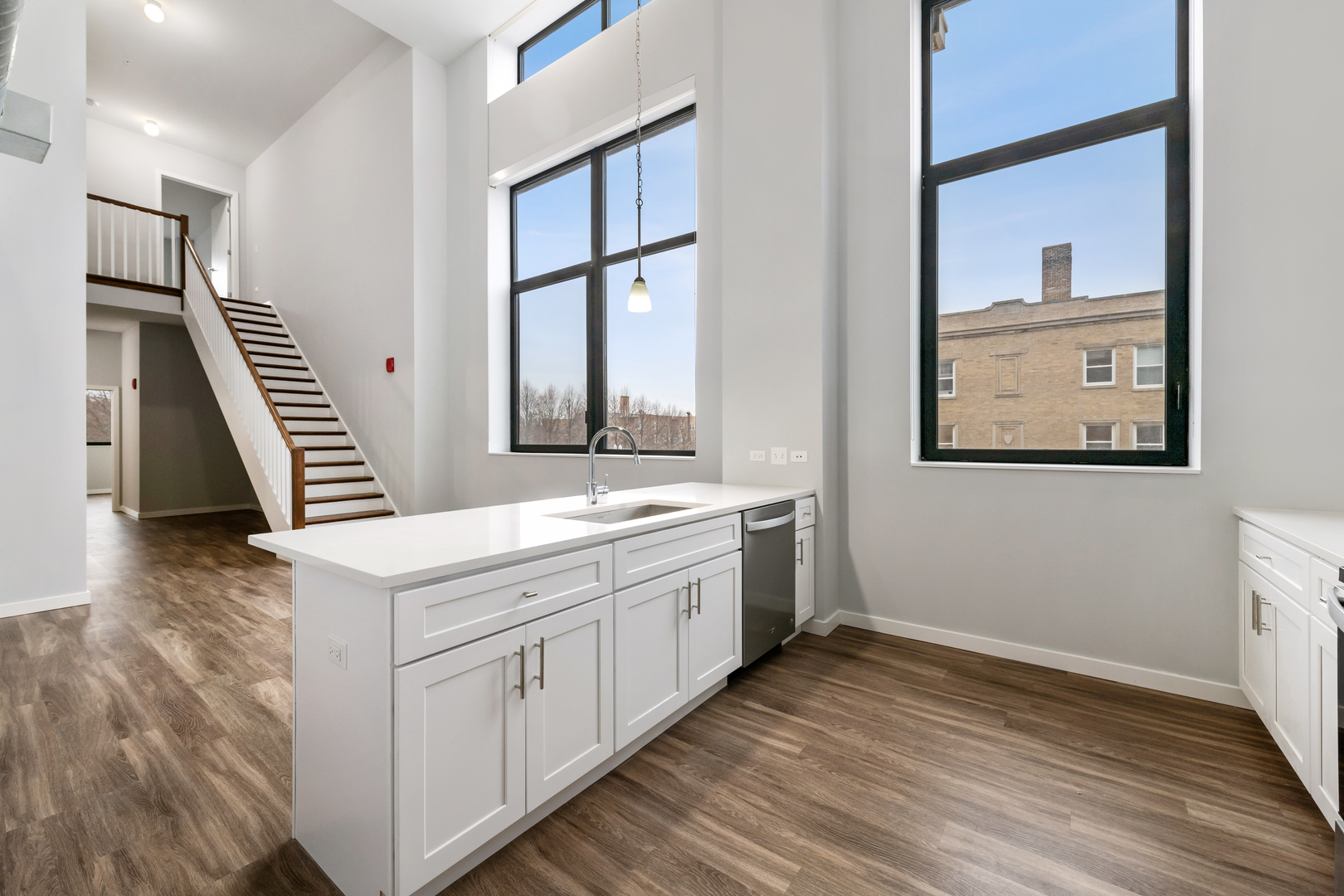 1900 West Lawrence Avenue, Unit 231 Chicago, IL 60640 - Photo 9 of 23 a room with a sink and a window