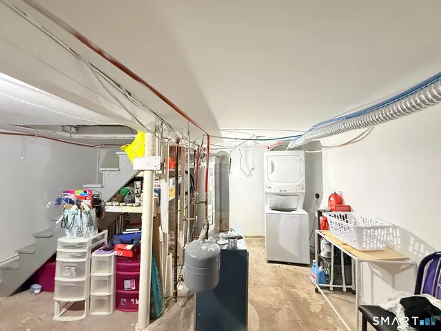 a storage room with furniture and a window