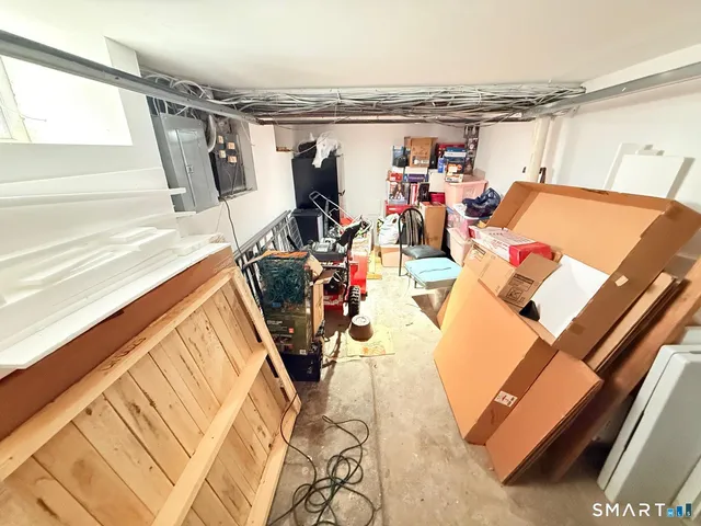 a view of a room with storage and utility room