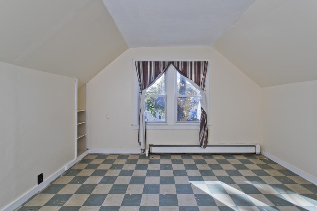 129 Eddy Street Springfield, MA 01104 - Photo 12 of 40 a view of an empty room and window