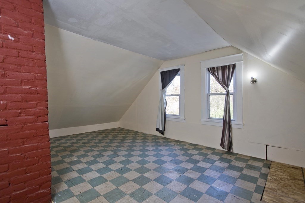 129 Eddy Street Springfield, MA 01104 - Photo 31 of 40 a view of an empty room and window