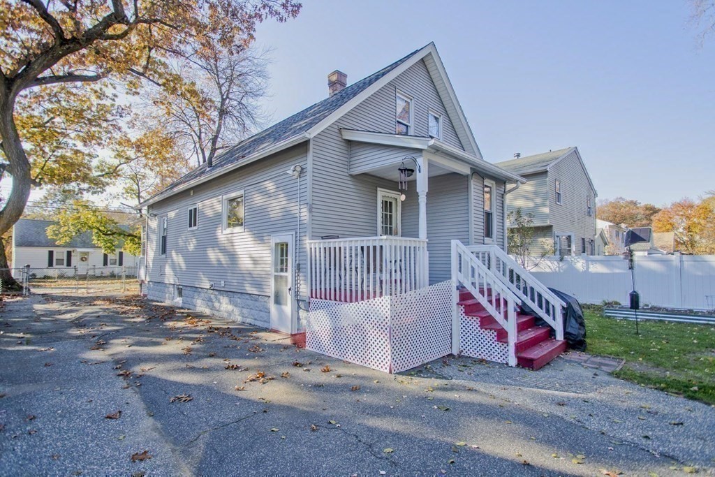 129 Eddy Street Springfield, MA 01104 - Photo 33 of 40 a view of a house with a yard