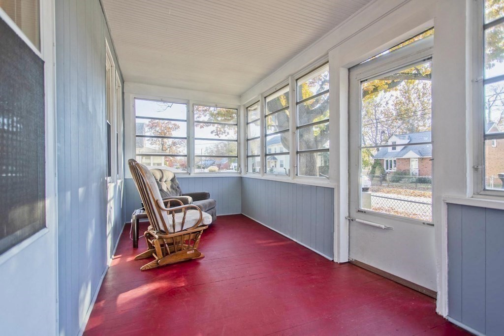 129 Eddy Street Springfield, MA 01104 - Photo 35 of 40 a view of a workspace with furniture and a window