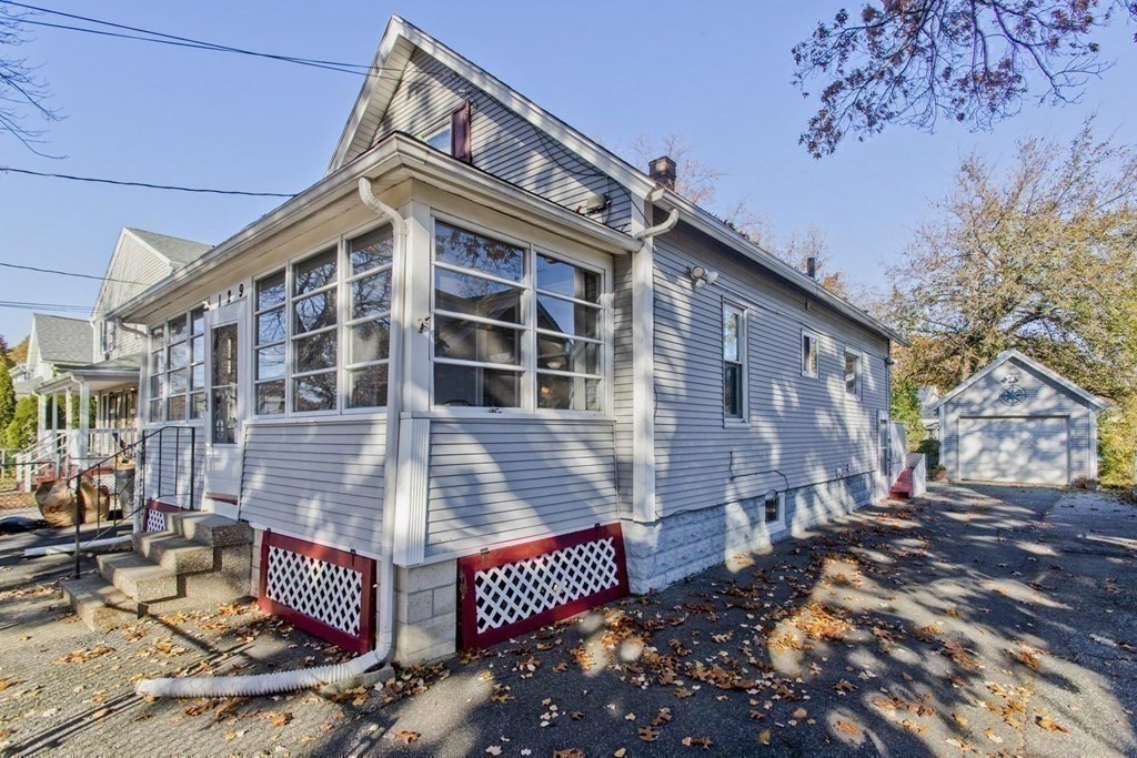 129 Eddy Street Springfield, MA 01104 - Photo 40 of 40 a front view of a house with a yard