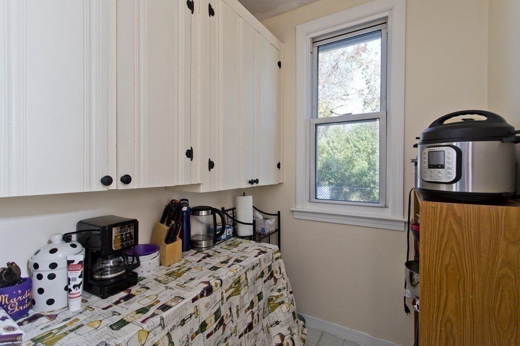 129 Eddy Street Springfield, MA 01104 - Photo 5 of 40 a room with storage and utility
