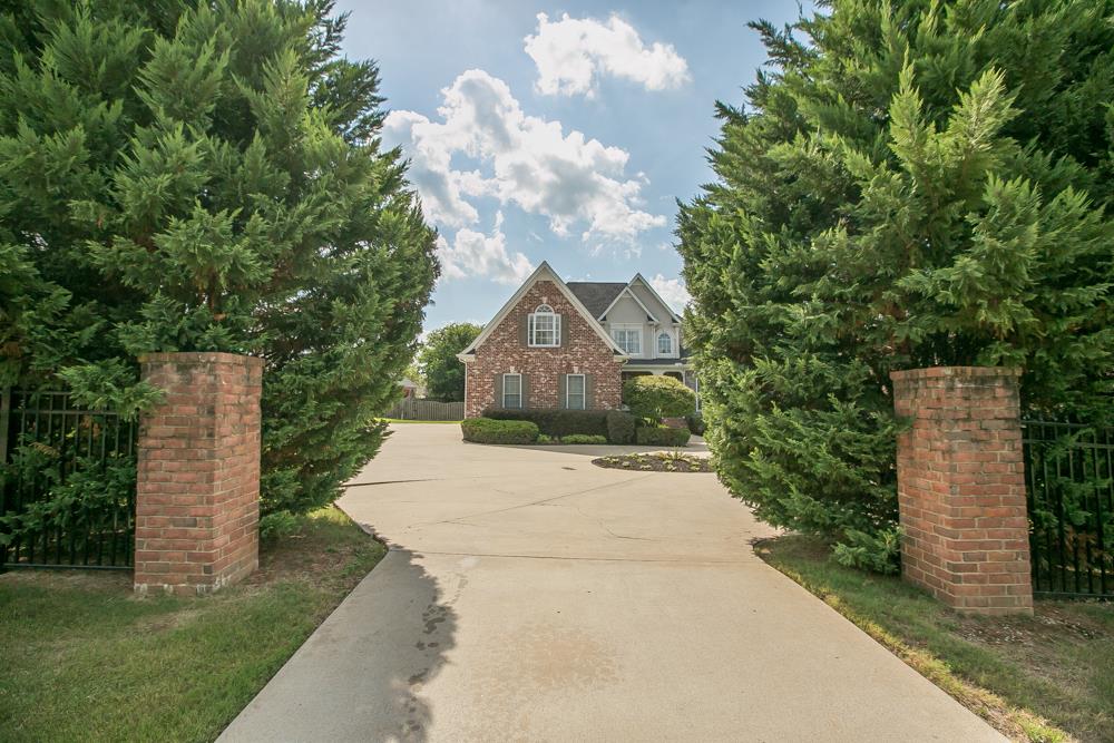 3465 Sulphur Springs Road Murfreesboro, TN 37129 - Photo 2 of 30 Privacy in front with Mature Trees. Prime location. Over 2/3 of an acre lot with fenced yard.