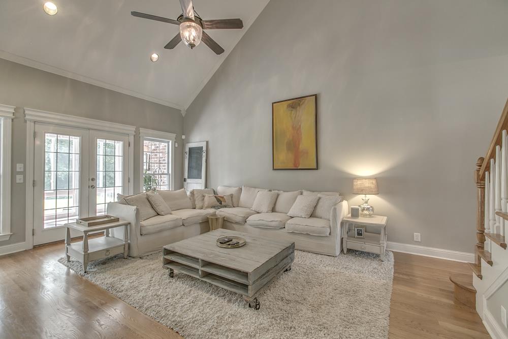 3465 Sulphur Springs Road Murfreesboro, TN 37129 - Photo 8 of 30 Great Room wih Ceiling Fan and Hardwood Floors. Door leading to Florida Room.