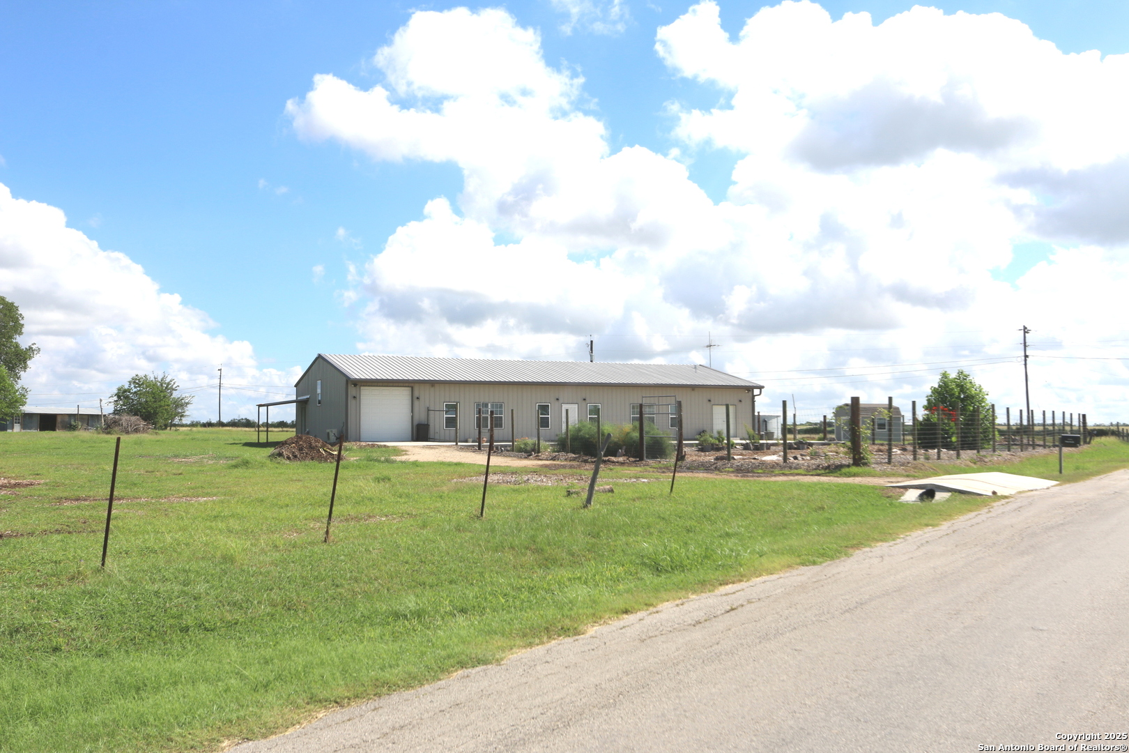 1221 North Santa Clara Road Marion, TX 78124 - Photo 13 of 55 a view of a backyard with a garden