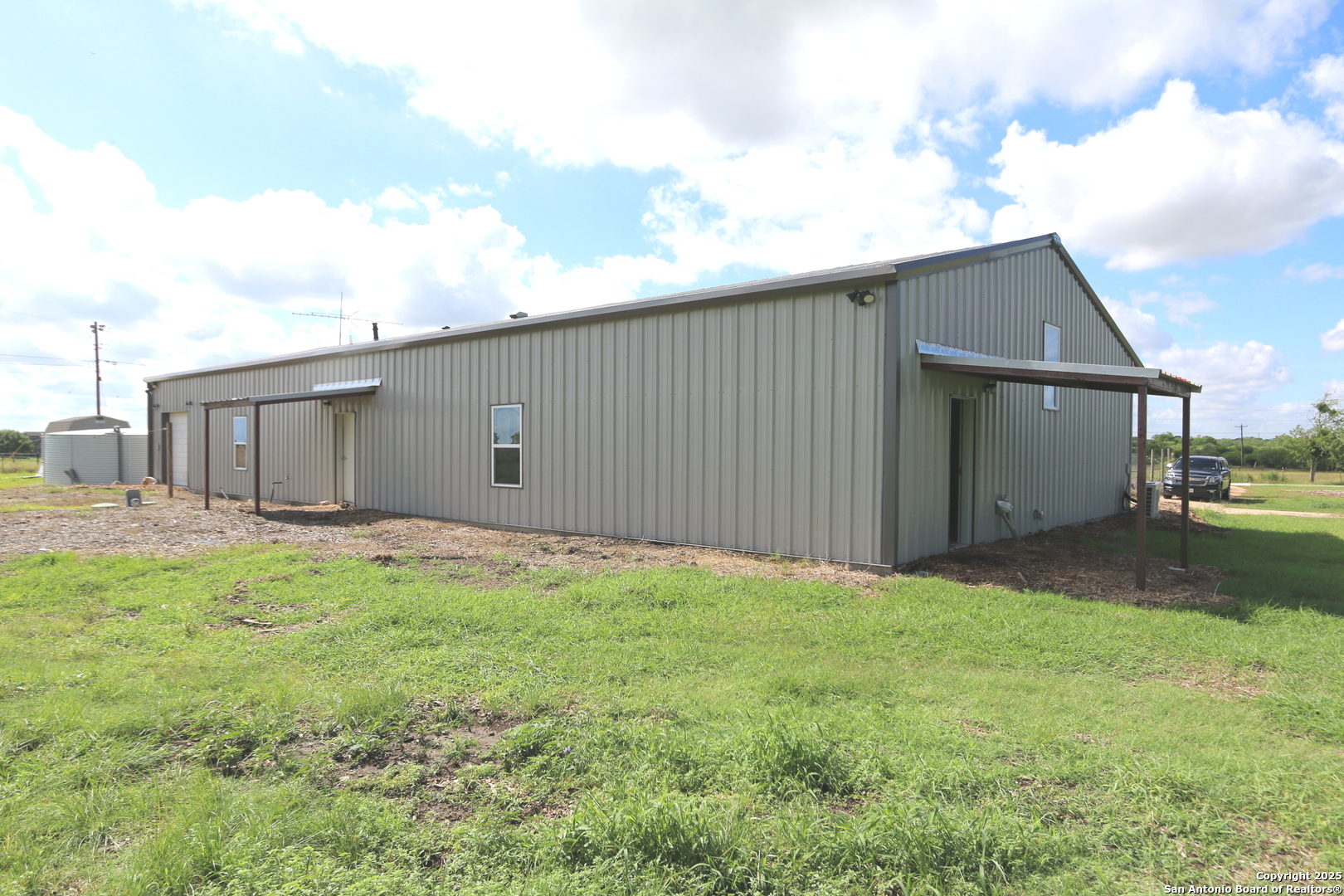 1221 North Santa Clara Road Marion, TX 78124 - Photo 37 of 55 a backyard of a house with lots of green space