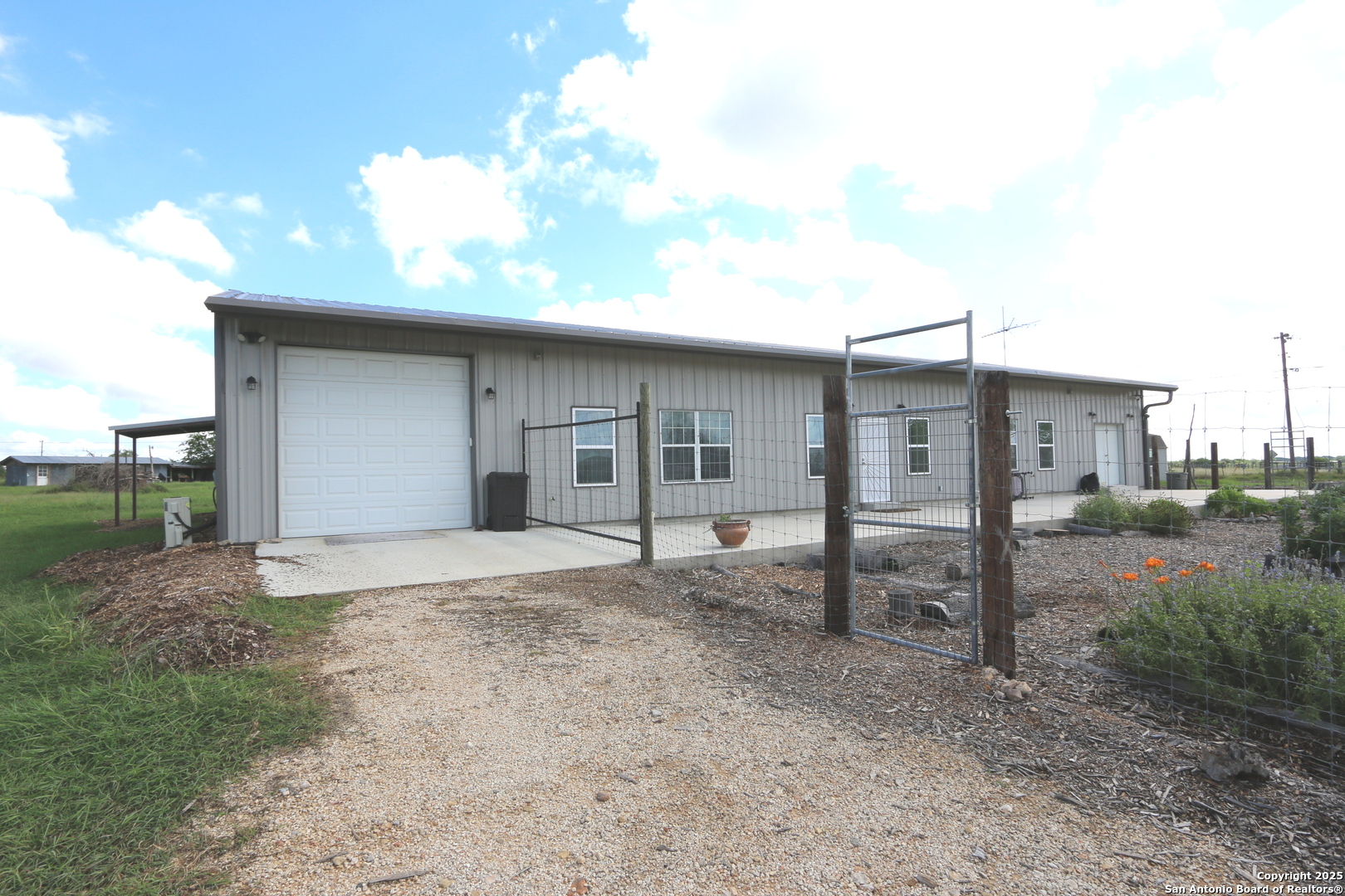1221 North Santa Clara Road Marion, TX 78124 - Photo 38 of 55 a house view with a backyard space
