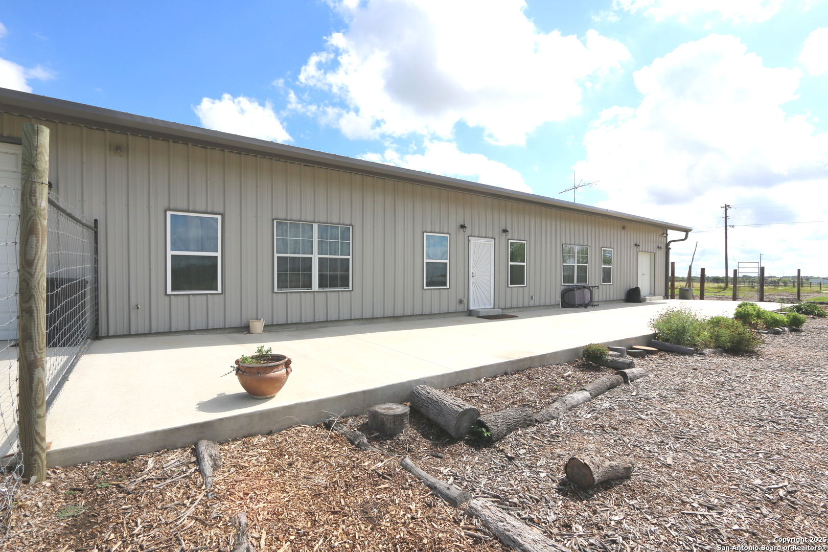 1221 North Santa Clara Road Marion, TX 78124 - Photo 39 of 55 a front view of a house with a yard