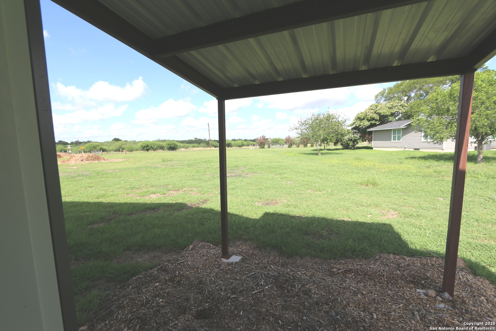 1221 North Santa Clara Road Marion, TX 78124 - Photo 43 of 55 a view of a road from a yard