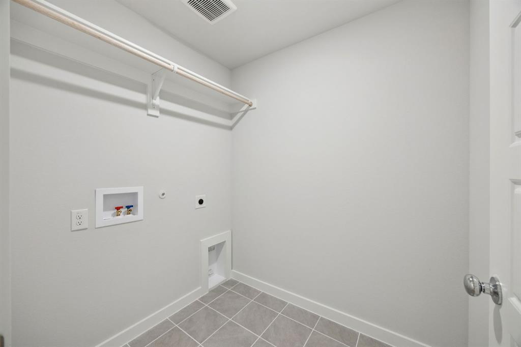 15033 Santoscoy Street Haslet, TX 76052 - Photo 20 of 27 Utility Room in the Hadley home plan by Trophy Signature Homes – REPRESENTATIVE PHOTO