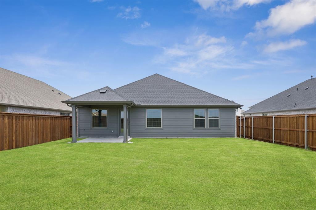15033 Santoscoy Street Haslet, TX 76052 - Photo 23 of 27 Patio in the Hadley home plan by Trophy Signature Homes – REPRESENTATIVE PHOTO