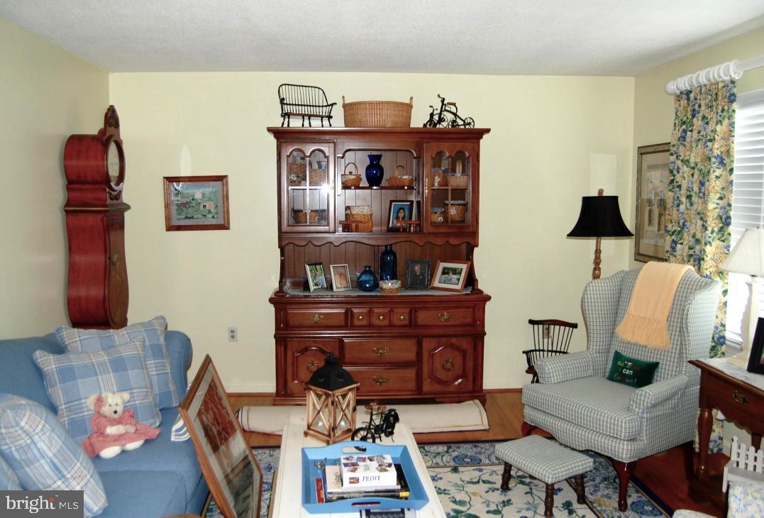 210 East 3rd Avenue Ranson, WV 25438 - Photo 6 of 33 Formal living room with hardwood floors...
