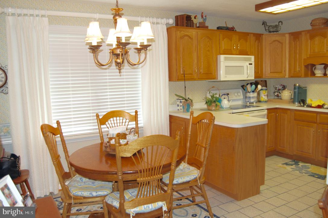 210 East 3rd Avenue Ranson, WV 25438 - Photo 9 of 33 Open combo kitchen / dining area...