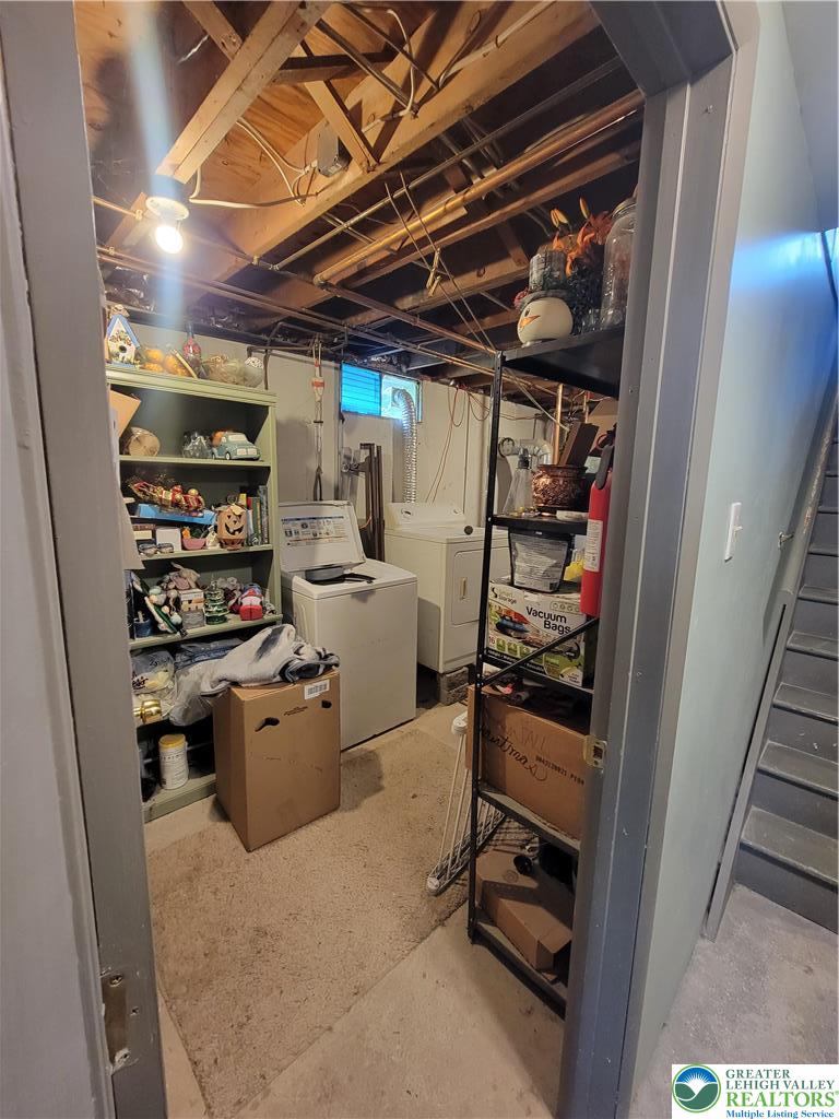 320 Hillside Street Forest City, PA 18421 - Photo 19 of 24 a storage room with water heater and racks