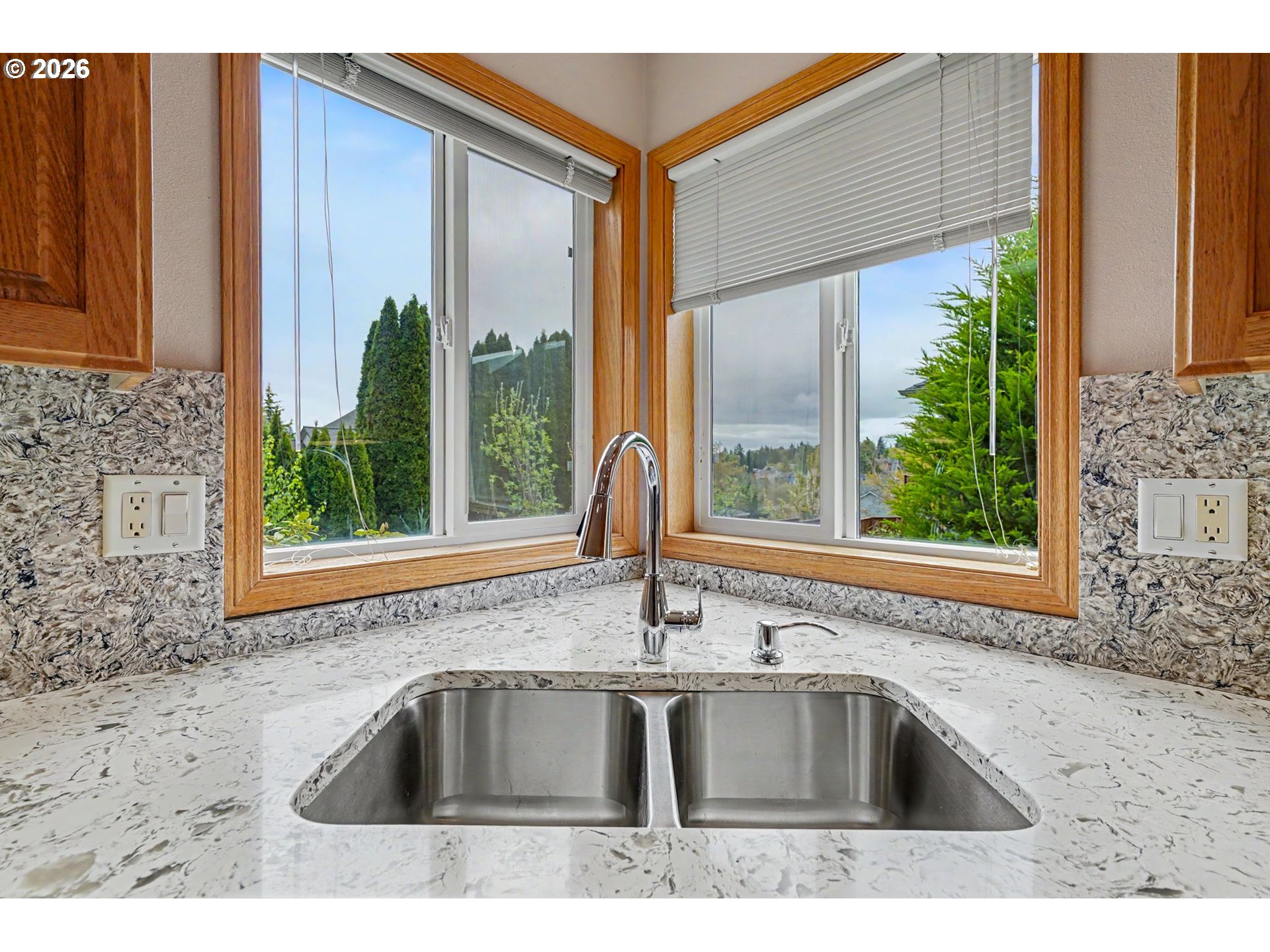 1470 Ranier Loop Northwest Salem, OR 97304 - Photo 18 of 48 a kitchen that has a sink and a window