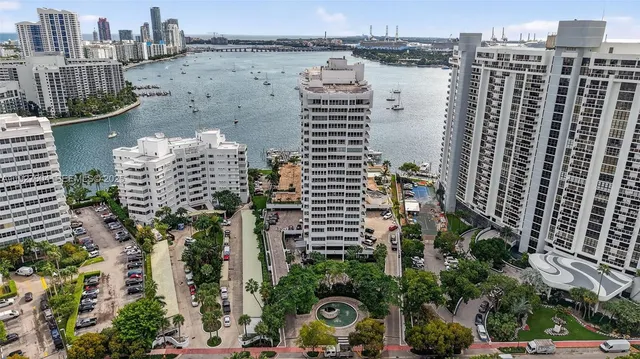 a view of a city with lawn chairs