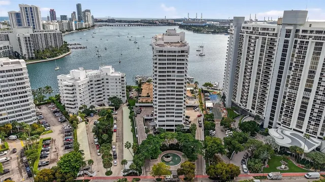 a view of a city with lawn chairs