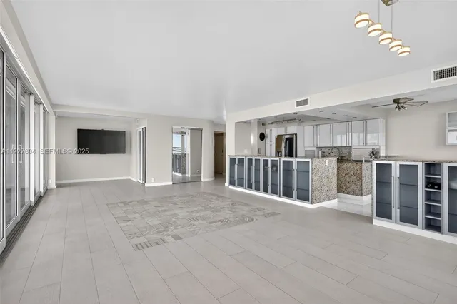 a view of a livingroom with wooden floor
