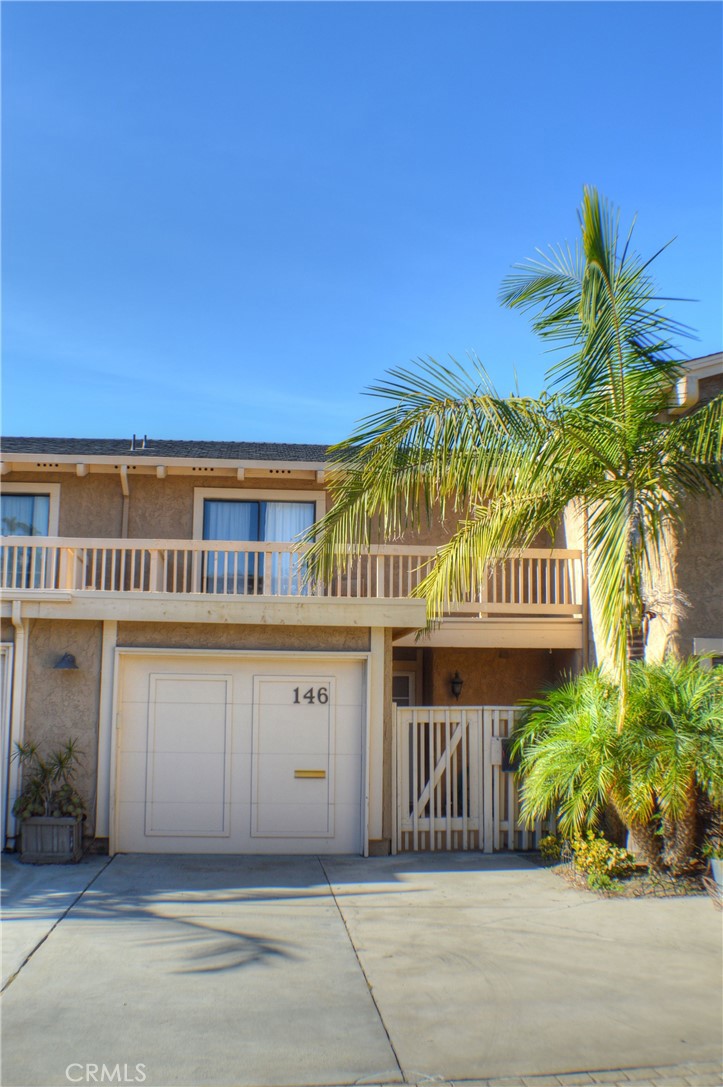 146 Avenida Baja San Clemente, CA 92672 - Photo 11 of 41 a front view of a building with a garden