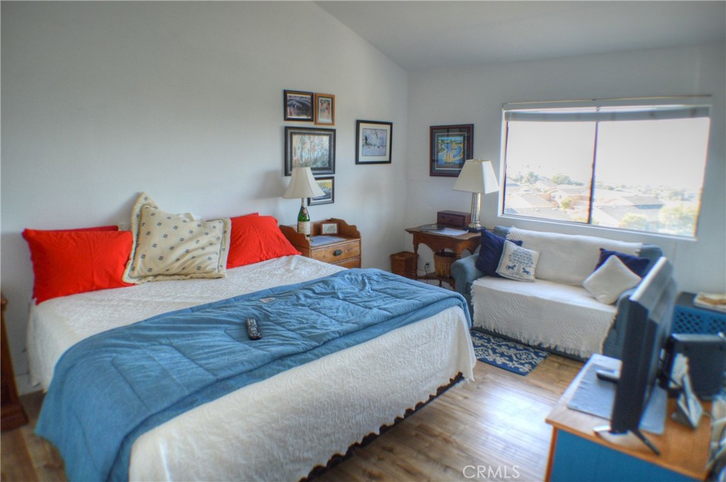 146 Avenida Baja San Clemente, CA 92672 - Photo 36 of 41 a bedroom with bed and window