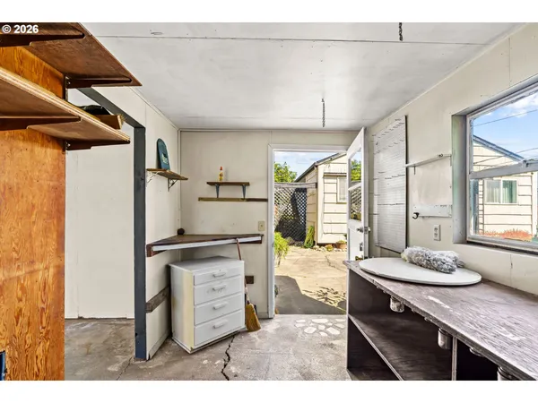 a kitchen with stainless steel appliances kitchen island granite countertop a sink stove and cabinets