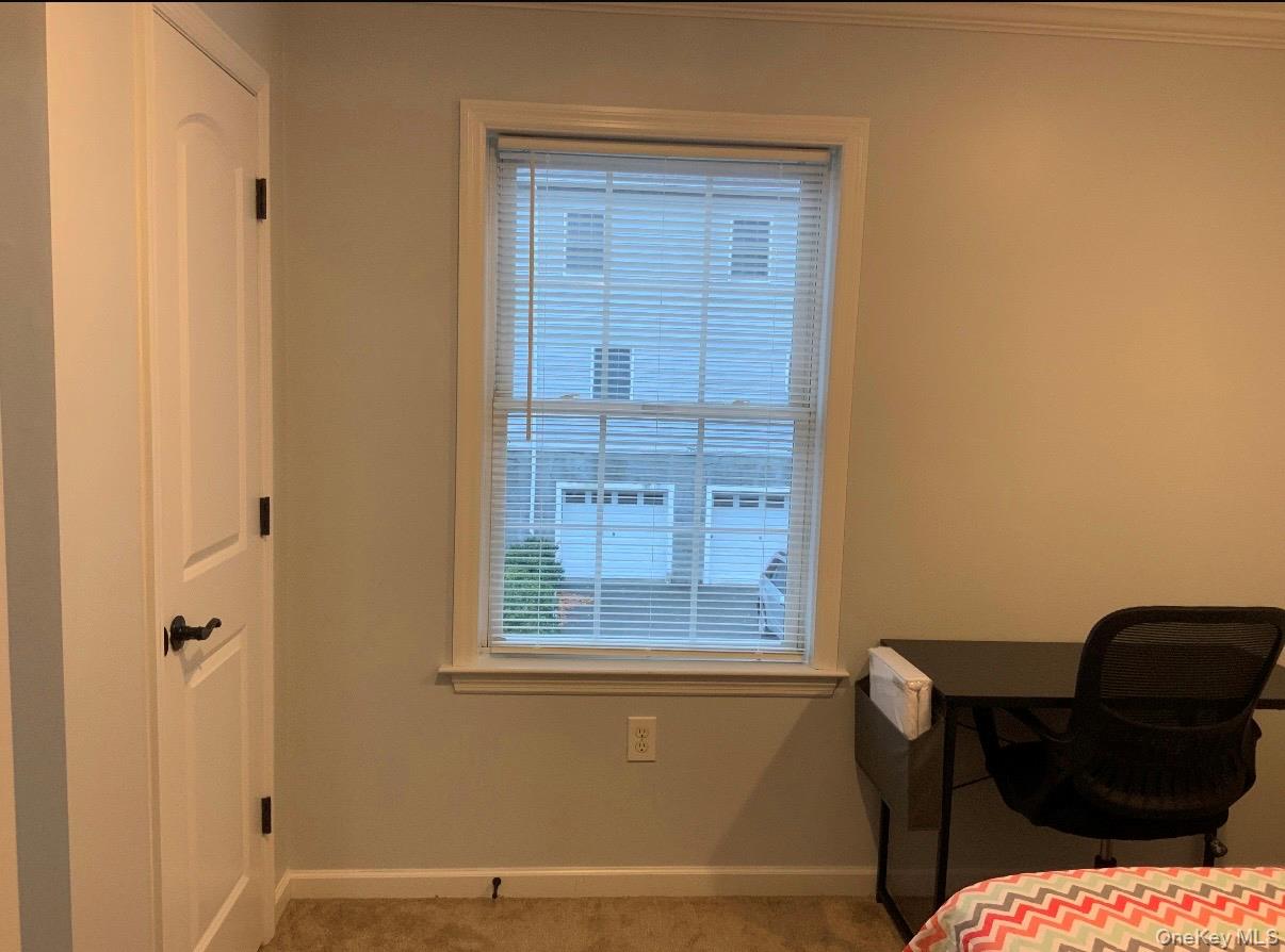 115 A High Street Peekskill, NY 10566 - Photo 12 of 17 a view of a door and chair in a room