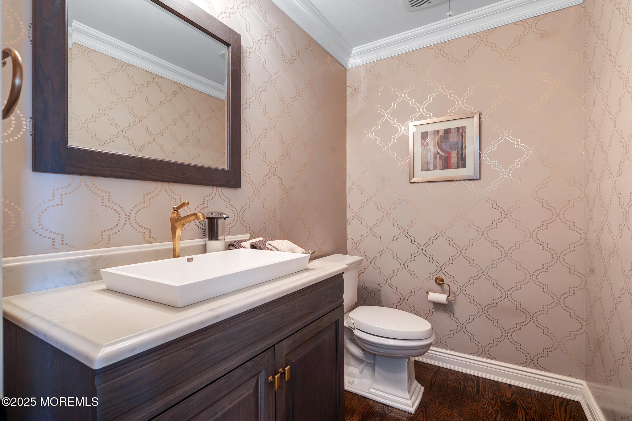 4 Garnet Street Morganville, NJ 07751 - Photo 15 of 70 a bathroom with a toilet a sink and mirror