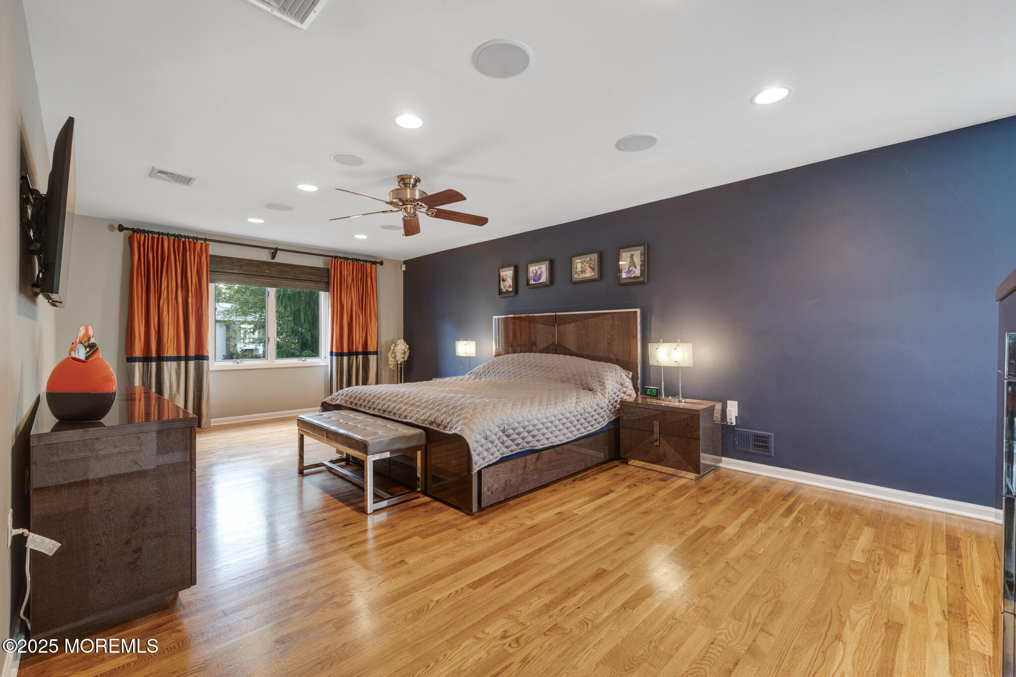 4 Garnet Street Morganville, NJ 07751 - Photo 19 of 70 a bedroom with a bed and wooden floor