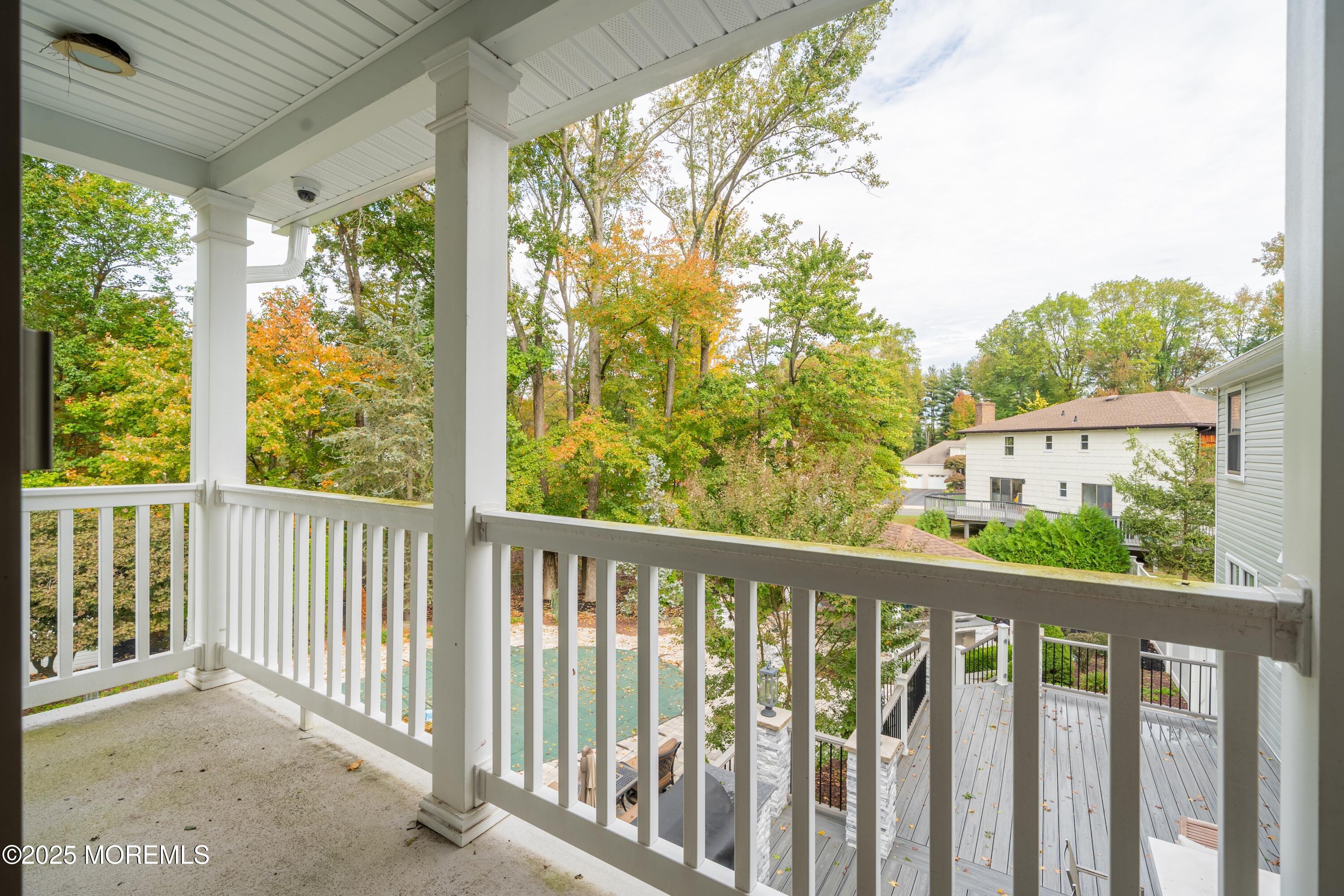 4 Garnet Street Morganville, NJ 07751 - Photo 25 of 70 a view of a porch with a yard