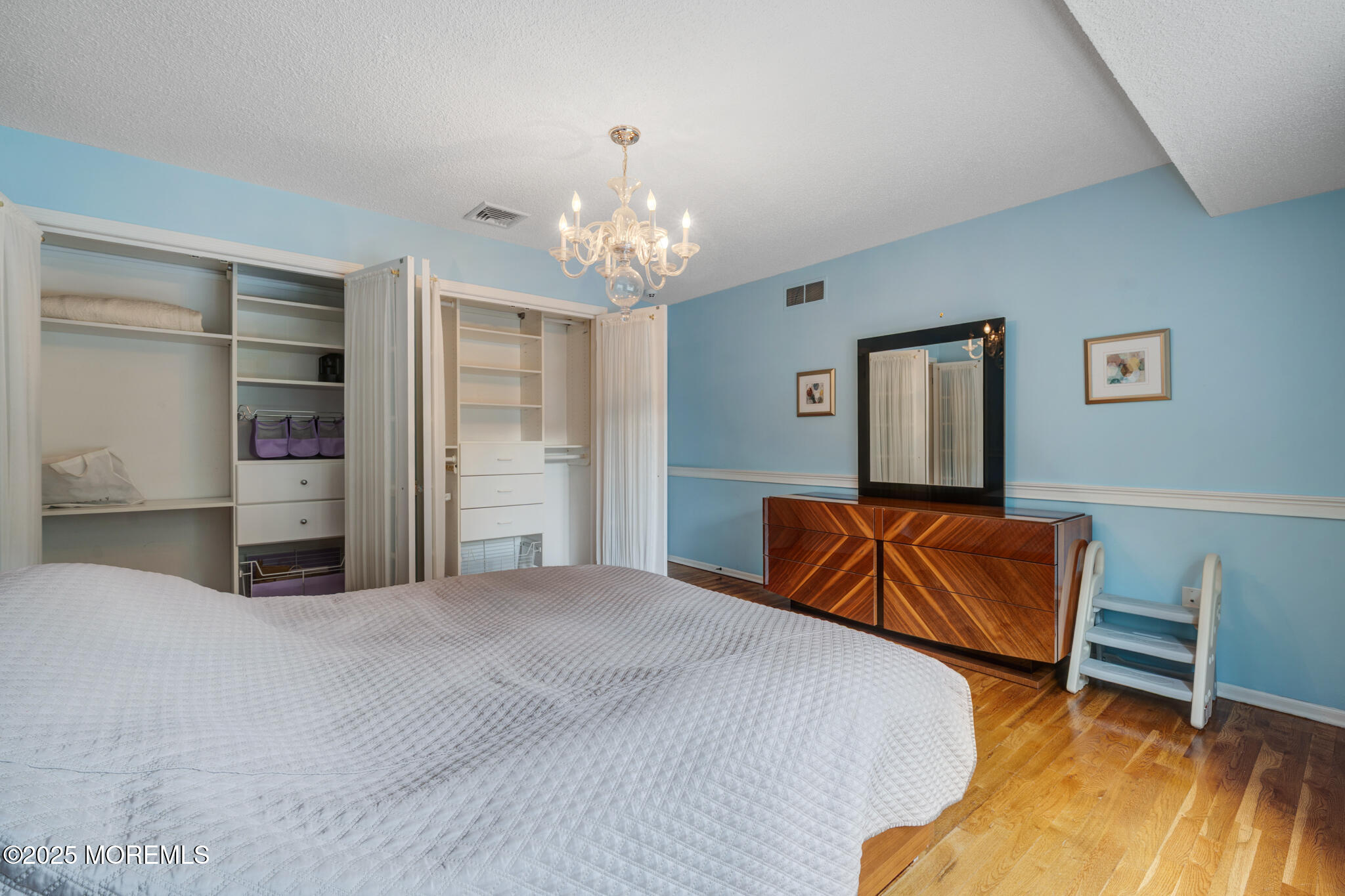 4 Garnet Street Morganville, NJ 07751 - Photo 33 of 70 a bedroom with a bed and a couch