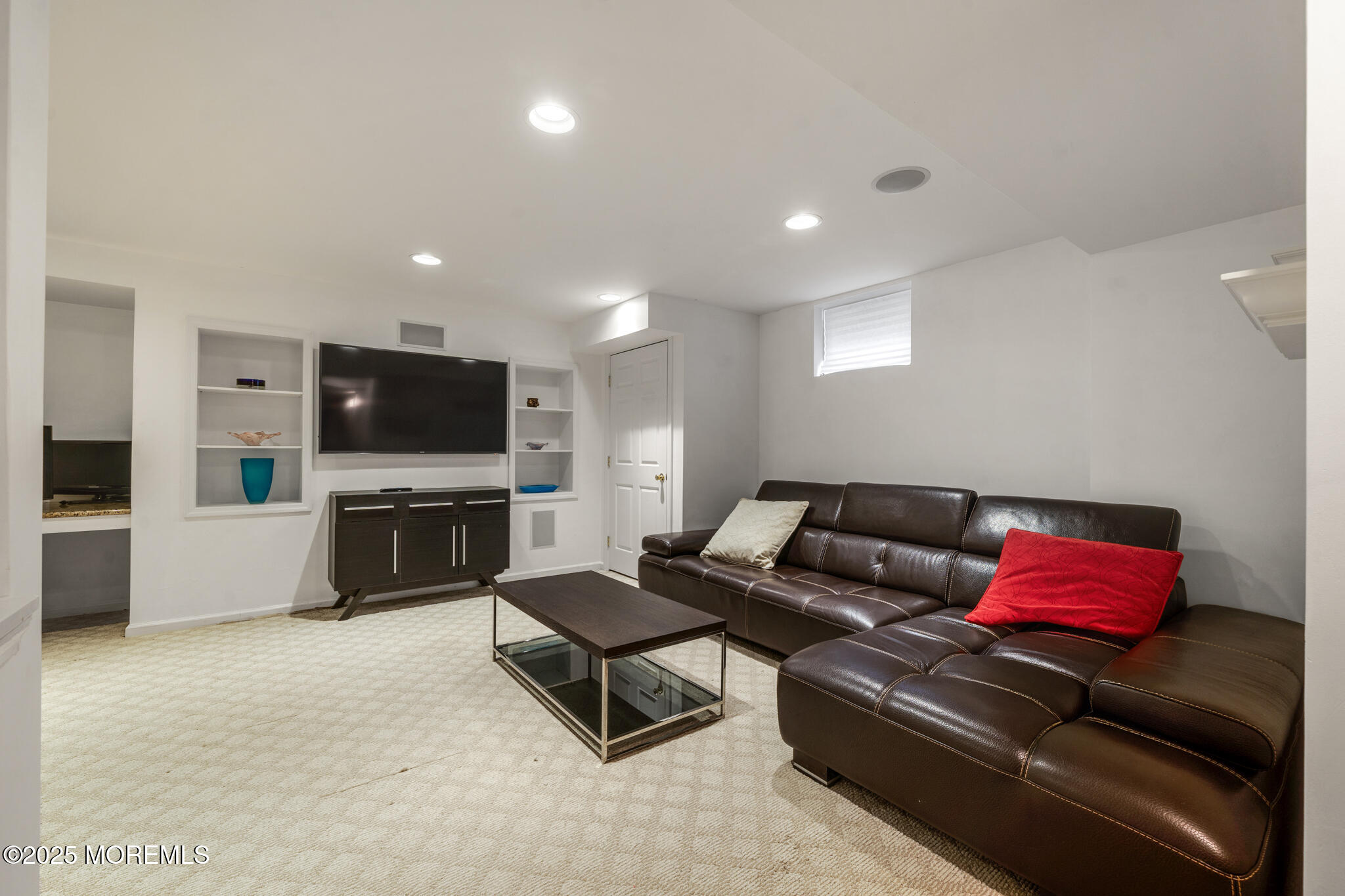 4 Garnet Street Morganville, NJ 07751 - Photo 37 of 70 a living room with furniture and a flat screen tv