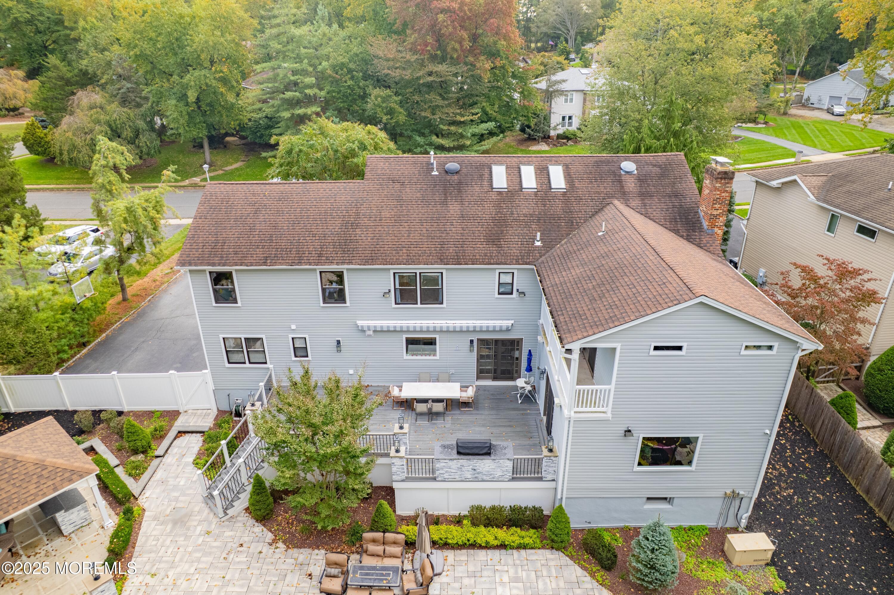 4 Garnet Street Morganville, NJ 07751 - Photo 45 of 70 an aerial view of a house with a yard