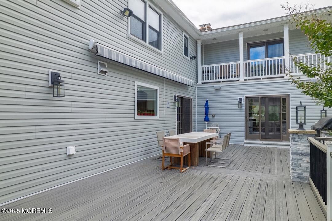 4 Garnet Street Morganville, NJ 07751 - Photo 47 of 70 a view of a house with wooden deck