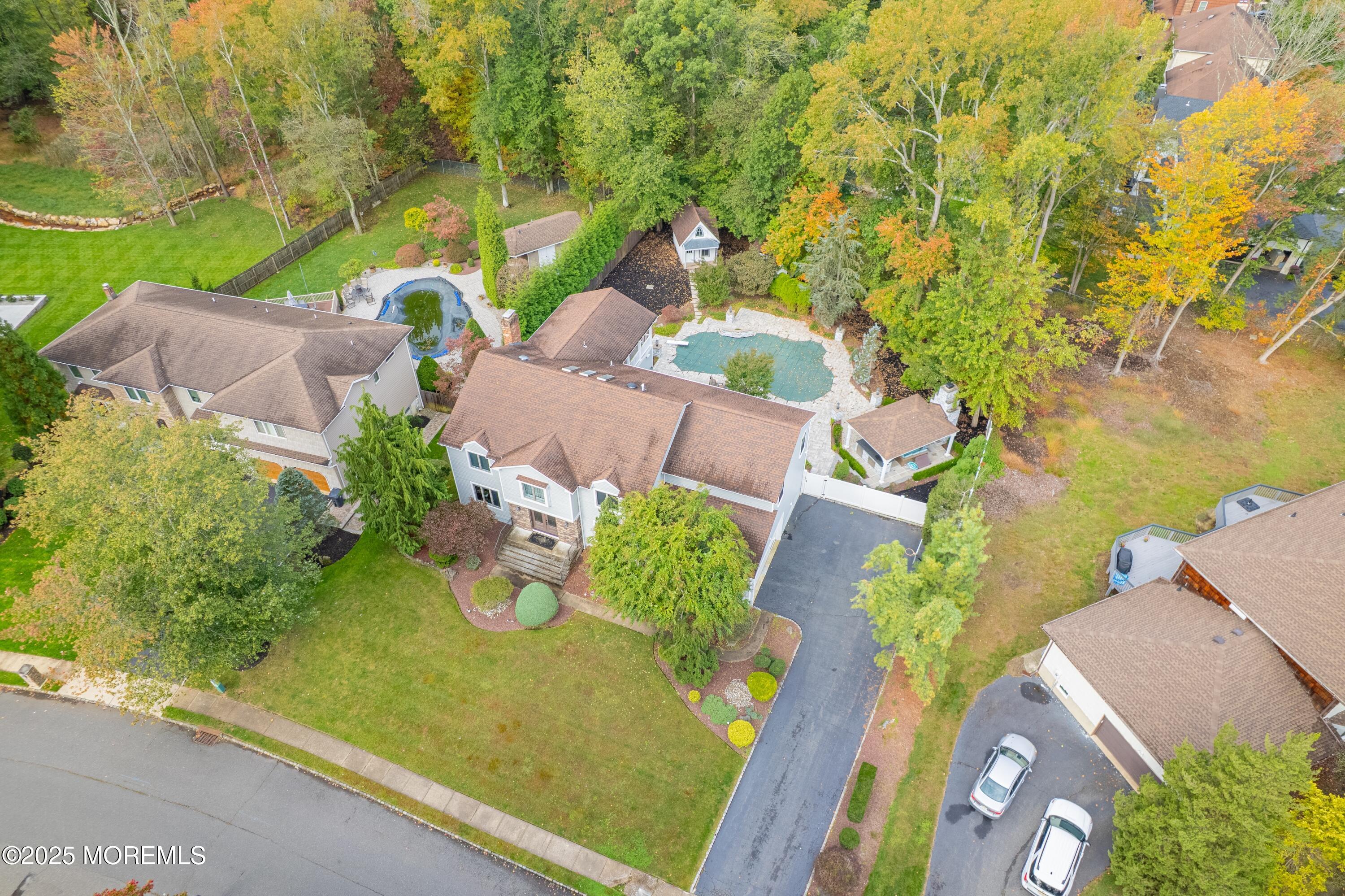 4 Garnet Street Morganville, NJ 07751 - Photo 56 of 70 an aerial view of a house with yard swimming pool and outdoor seating